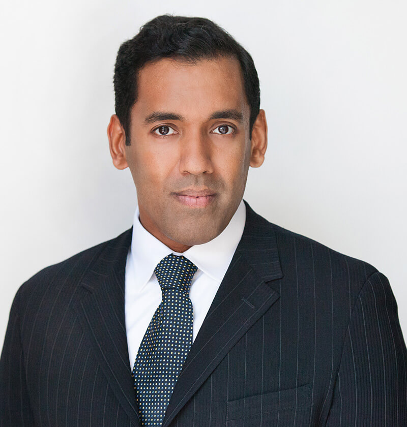 Sunil Oommen in suit Headshot